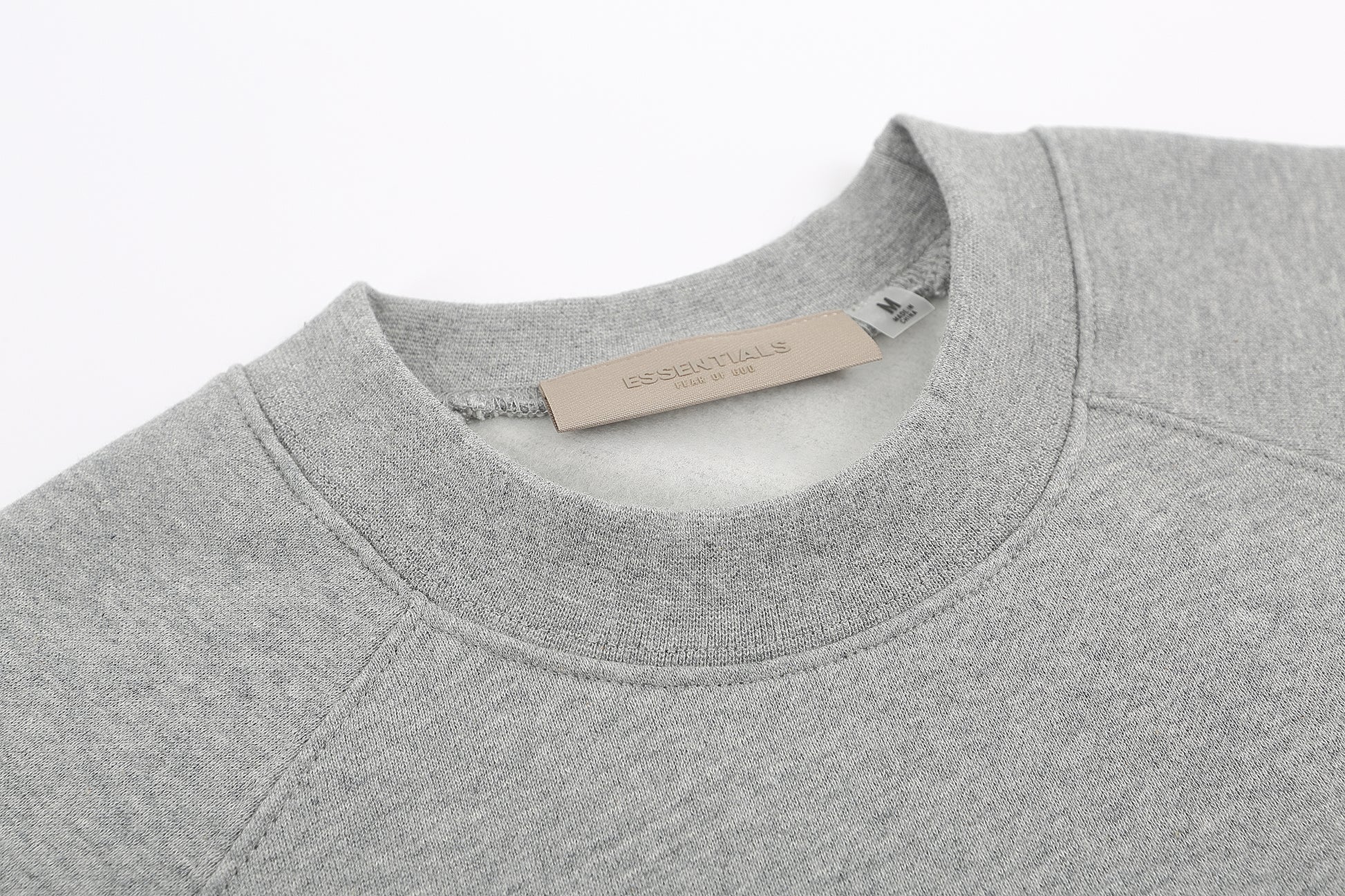 SUDADERA ESSENTIALS